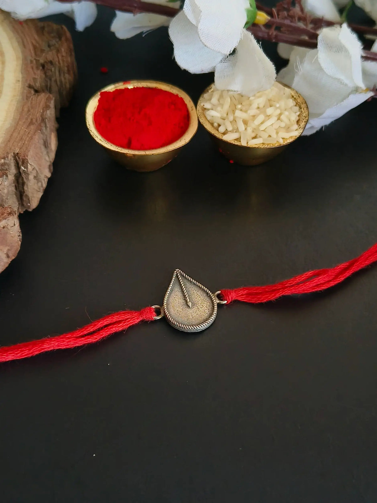 Textured Silver Teardrop Rakhi Thread | Sarichka Fashion